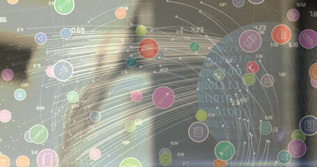 Image of globe with digital icons over blurred background