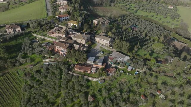 Stunning Drone Footage of Olive Farms, Vineyards and quant villages in Tuscany, Italy during a sunny spring day 