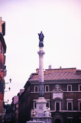 View of the Column of the Immaculate Conception at Piazza Mignanelli, towards the south east part of Piazza di Spagna in Rome, Italy during 1990s