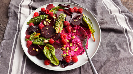 Healthy Beet Salad with raspberry, red pray, nuts 