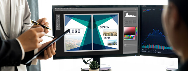 Graphic designer software for modern design of web page and commercial brisk ads showing on the computer screen