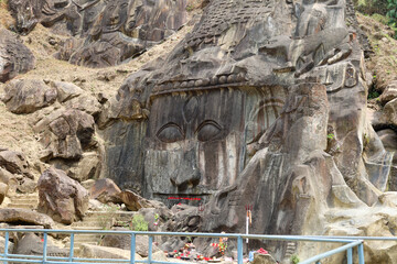 Sculptures carved into the rock at the archaeological site of Unakoti in the state of Tripura. India.