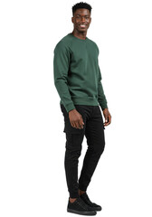 Naklejka premium Smiling man in green sweatshirt standing against a plain backdrop