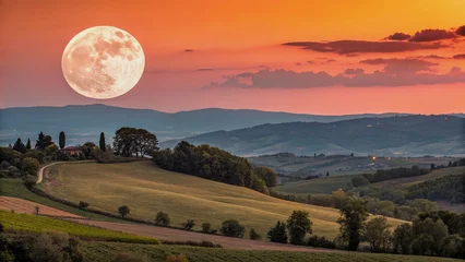 Fototapete Rund Full moon over a Tuscan landscape at sunset. © MDMIZANUR