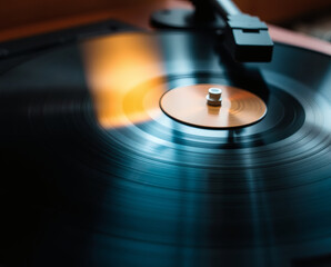 Spinning melodies create a warm atmosphere in a cozy room filled with nostalgia and music appreciation