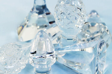 Crystal carved stoppers from carafe closeup