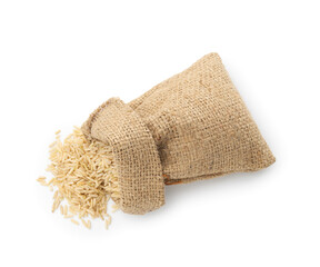 Raw brown rice in sack isolated on white, top view