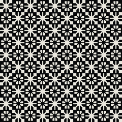 Seamless black and white mid century modern floral pattern for banners, backgrounds, fabric design, home decor.