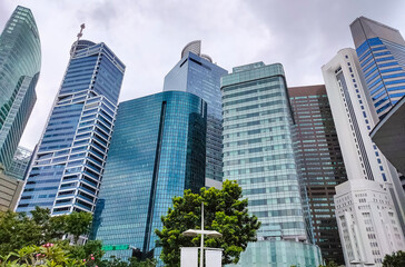 View of modern business skyscrapers glass and sky view landscape of commercial building in central city Singapore