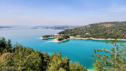 Fototapeta premium It is mesmerizing to watch the turquoise splendor of Seyhan Lake under the spring sunshine.