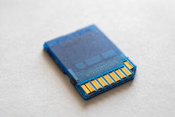 Blue sd card on a white table