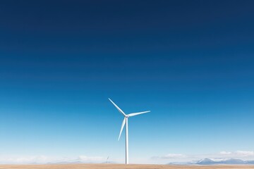 wind turbines scattered across open landscape with vast blue sky above offering ample copy space embodying sustainable