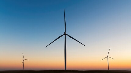 Fototapeta premium tranquil scene depicting wind turbines at sunset their silhouettes gracefully dominating landscape set against vast