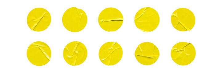 Big set of yellow glossy paper circles with creases, isolated blank round sticker on transparent background