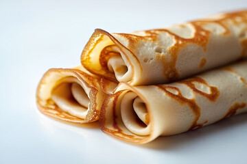 A stack of pancakes with a white background