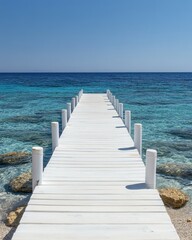 Fototapeta premium Serene turquoise sea view from white wooden pier under clear blue sky in tropical paradise