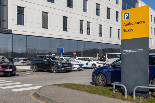 March 15 2025 Evreux Normandie Modern building with parking lot on clear day