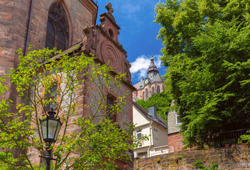 Landgrafenschloss castle on hill above traditional fachwerk houses in Marburg Germany on a sunny...