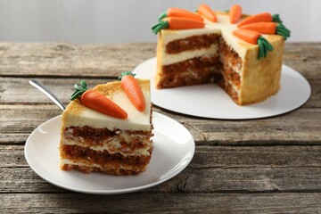 Delicious homemade carrot cake on wooden table
