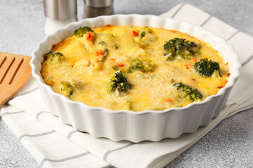 Delicious vegetable casserole on light table, closeup