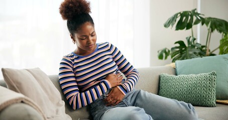 Cramps, pain and woman in lounge, home and reaction to food poisoning, indigestion and...