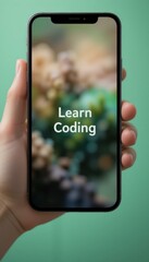 Modern Hand Holding Smartphone 'Learn Coding' Text Soft-Focus Green Brown Bokeh Background - Online Coding Courses Tech Education Concept