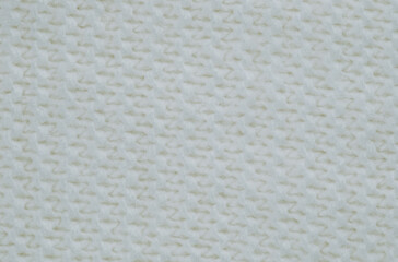 Knitted  fabric texture background. Fabric texture as a backdrop.