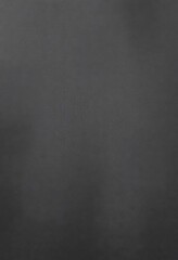 Dark grey textured background, subtle shadows, concrete, dim, backdrop