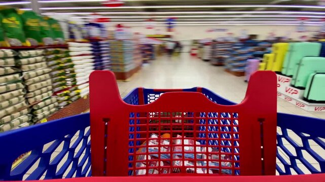 A first‑person view moving down a bright central aisle inside a Lulu Hypermarket, continuing your modern retail catalog theme.