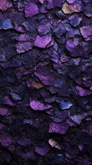 Textured purple rock formation with shimmering highlights captured in natural light