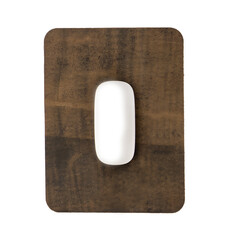 Obraz premium White mouse on abstract brown leather mouse pad isolated on white background