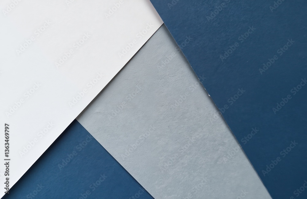 Poster geometric paper background with navy blue grey and white shades. macro photography of abstract struc
