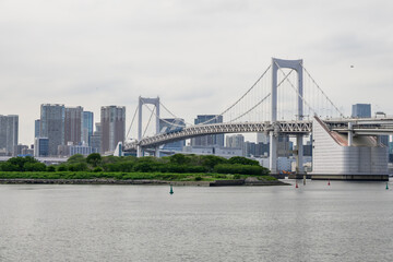 Rainbow Bridge over Tokyo Bay connects Shibaura and Odaiba. Completed in 1993, its a vital infrastructure and a landmark