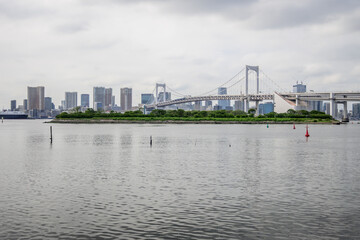 Rainbow Bridge over Tokyo Bay connects Shibaura and Odaiba. Completed in 1993, its a vital infrastructure and a landmark