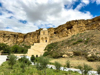 Fototapeta premium azerbaijan, diri baba, shamakhi, 14th, century, mausoleum, tomb, carved, rock, petra, jordan, sufi, muslim, allah, islam, ancient solid, vault, dome, thinker, jinn, jinny, lamp, caucasus, prayer, sain
