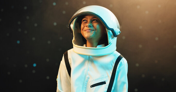 Happy girl, thinking or astronaut with dream in spacesuit at night for galaxy adventure, journey or radiation. Face, female person or thoughtful teenager with ambition in wonder, stars or curiosity