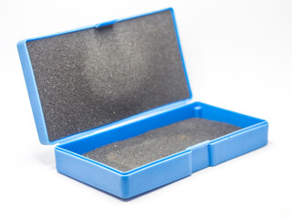 Blue empty plastic box with sponge isolated on white background