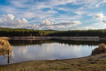 Very beautiful lake view in nature. Reflection of trees and sky in the lake.