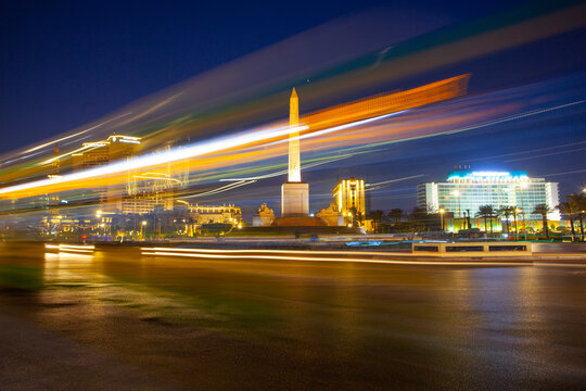 Cairo, Egypt - March 1, 2025: : Famous Ramses II obelisk and Tahrir Square with traffic ,  evening view, Cairo, Egypt