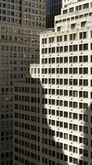 Fototapeta premium City skyscrapers, sunlight shadow, urban architecture, high-rise buildings, business district, aerial view, background cityscape, real estate