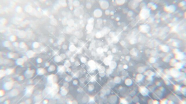 細かいシルバー系のキラキラ素材が下から上に漂うようにゆっくり移動する