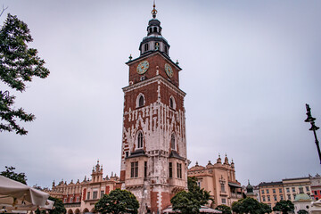 Fototapeta premium The Old Town Square in Cracow, featuring stunning architecture.