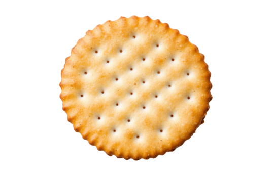 Golden round cracker on black background with salted surface, cut out