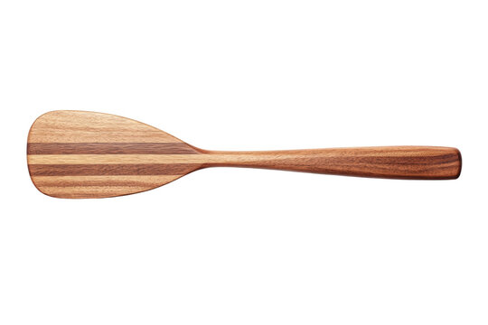 Wooden cooking spatula with striped design on white background, cut out