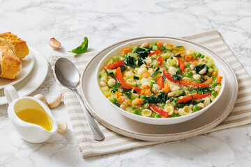 Vegetarian Minestrone with in white bowl, top view