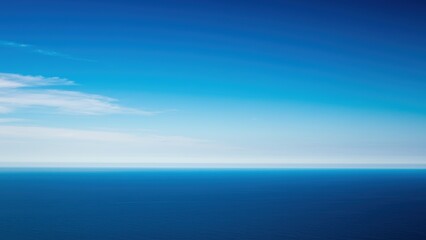Obraz premium A minimalist seascape, featuring a clear blue sky and serene ocean view.