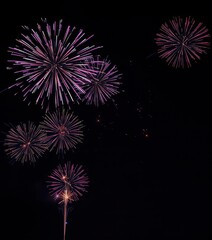 Night sky ablaze with colorful firework bursts, sparkling trails, trails, colorful, explosion