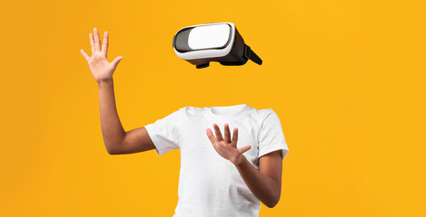 A person engages with virtual reality using a headset, their body visible but headless, against a...