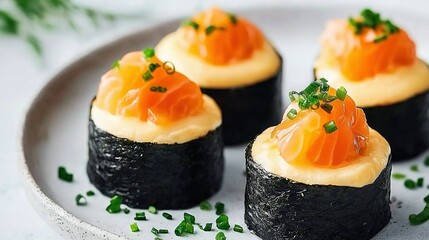   White sushi plate, adorned with sauce and decorative garnishes
