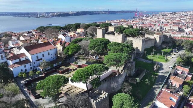 Sao Jorge Castle At Lisbon Lisbon District Portugal. Birds Eye View Of Medieval Building In Famous District Of City. Business Sky Downtown Cityscape. Backgrounds Famous. Lisbon Lisbon District.